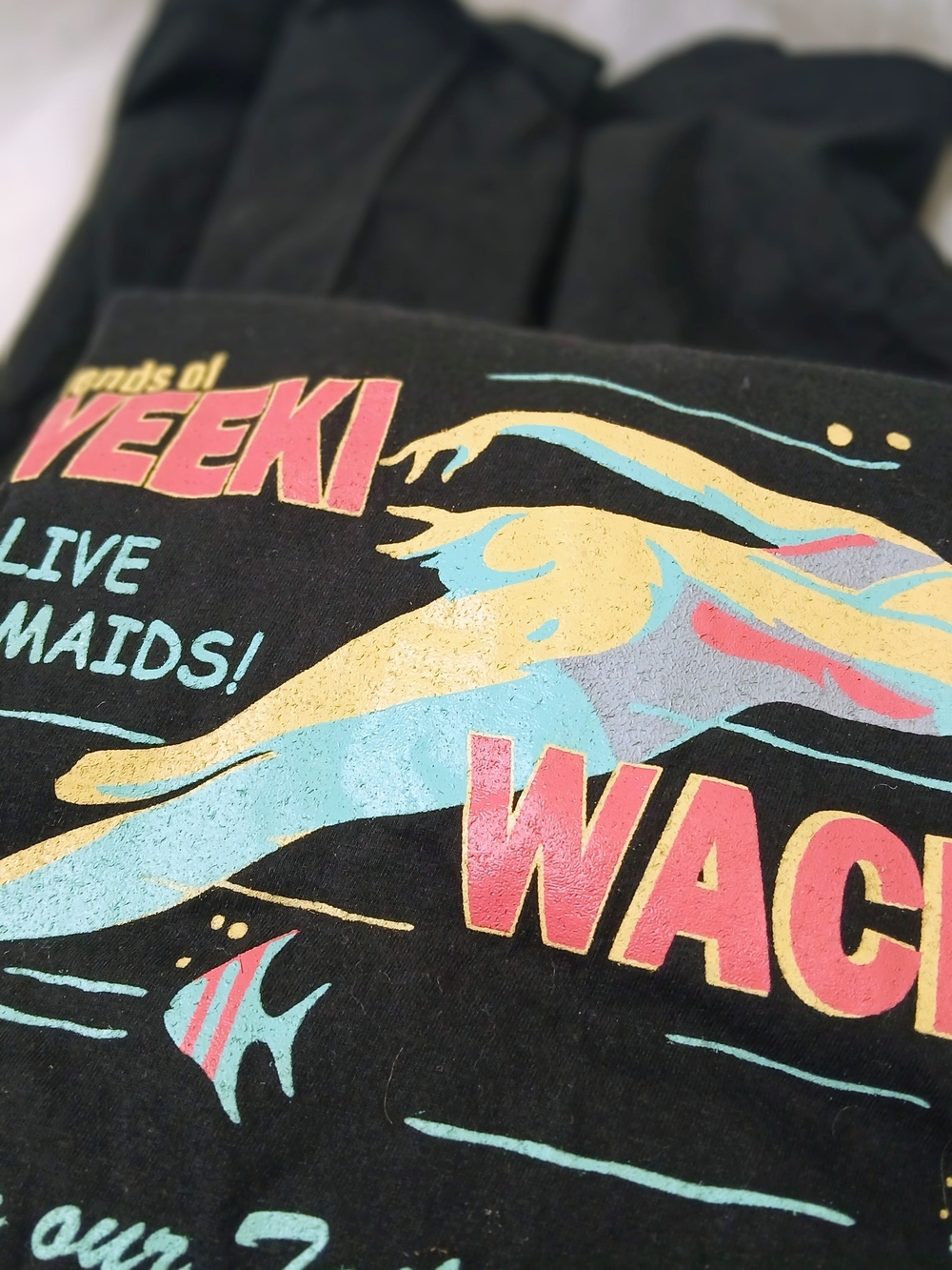 Graphic Black Tee with Retro Multicolor Mermaid Print